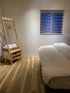 Voodi või voodid majutusasutuse Good Day Homestay toas