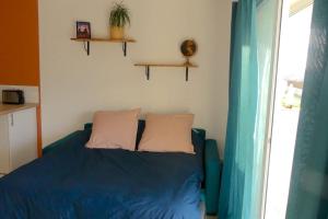 Кровать или кровати в номере Néo Cévenols Hostel