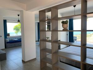 Ένα ή περισσότερα κρεβάτια σε δωμάτιο στο Relais Villa Bonifacio