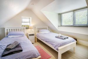 Voodi või voodid majutusasutuse Brewery Cottage toas