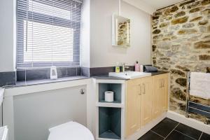 Vannituba majutusasutuses Brewery Cottage +15 fotot