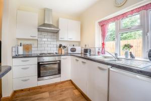 Dapur atau dapur kecil di Sunshine Lodge +16 gambar