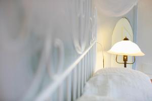 A bed or beds in a room at Al Porticciolo