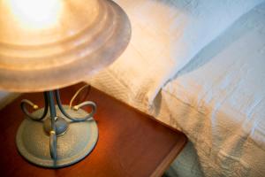 A bed or beds in a room at Al Porticciolo