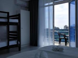 Voodi või voodid majutusasutuse Kolkhi Guest House toas