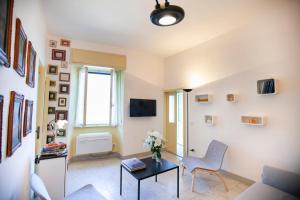 A television and/or entertainment centre at Al Porticciolo