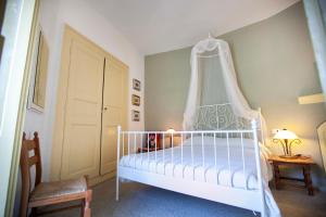A bed or beds in a room at Al Porticciolo