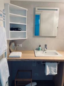 Kúpeľňa v ubytovaní Lussuoso appartamento nella magia del lago d'Orta