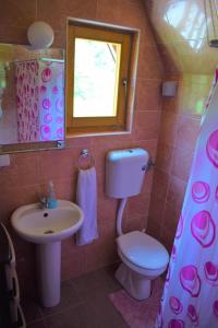 Kúpeľňa v ubytovaní Breeze Home Cottage
