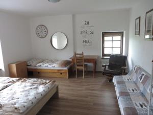 Posteľ alebo postele v izbe v ubytovaní Rodinný penzion Jimramovské Pavlovice až 24 osob!