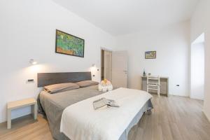 Posteľ alebo postele v izbe v ubytovaní Arco Rocks Apartments