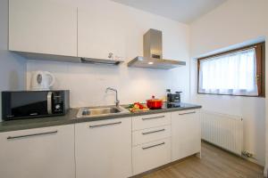 Kuchyňa alebo kuchynka v ubytovaní Arco Rocks Apartments