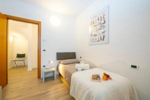 Posteľ alebo postele v izbe v ubytovaní Arco Rocks Apartments