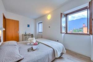 Posteľ alebo postele v izbe v ubytovaní Arco Rocks Apartments