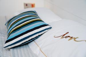 A bed or beds in a room at Domus Enea