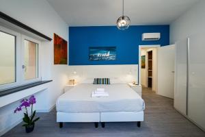 A bed or beds in a room at Domus Enea