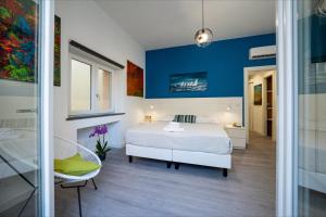 A bed or beds in a room at Domus Enea