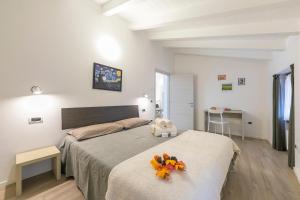 Posteľ alebo postele v izbe v ubytovaní Arco Rocks Apartments