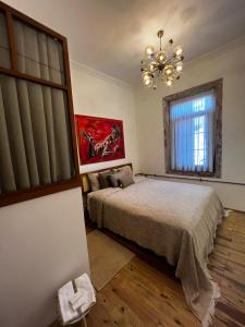 A bed or beds in a room at istifci
