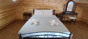 Un pat sau paturi într-o cameră la S&G HOME