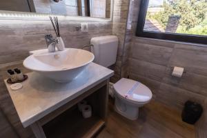 Koupelna v ubytování Verdi Rooms