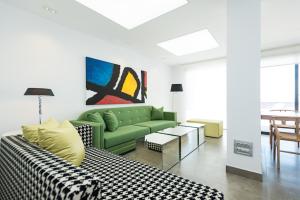Posezení v ubytování Altos de la Gloria Beach Apartments