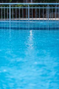 Bazén v ubytování Hotel Azurro - All Inclusive nebo v jeho okolí