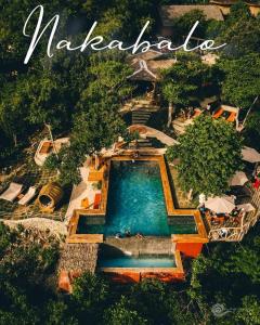 an aerial view of a swimming pool at a resort at Nakabalo Guesthouse & Restaurant in Siquijor