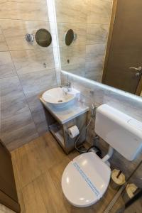 Koupelna v ubytování Verdi Rooms