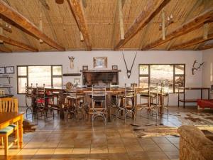 Posezení v ubytování Zoutpanputs Game Lodge