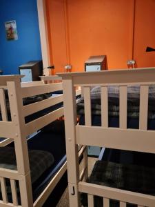 a group of bunk beds in a room at Belford Hostel in Edinburgh