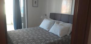 Ein Bett oder Betten in einem Zimmer der Unterkunft Apartmants Matić