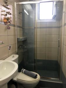 A bathroom at Plaisir Rooms