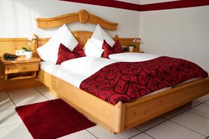 Postel nebo postele na pokoji v ubytování Hotel Weinhaus Wiedemann