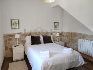 Кровать или кровати в номере Casa del Maestro