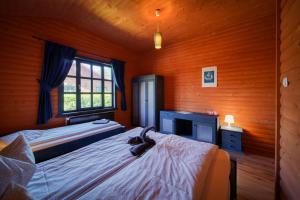 Llit o llits en una habitació de Desag Resort