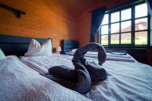 Postel nebo postele na pokoji v ubytování Desag Resort