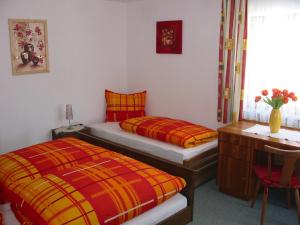 Postel nebo postele na pokoji v ubytování Apartment Alpenblick