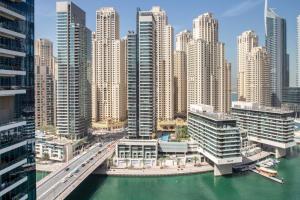 an aerial view of a city with tall buildings at Frank Porter - Silverene Tower in Dubai