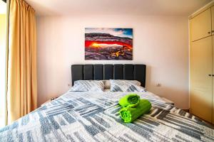 Giường trong phòng chung tại Lovely 1-bedroom apartment whit pool +16 ảnh