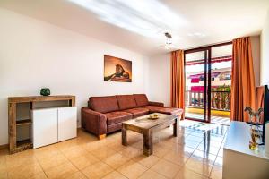 Khu vực ghế ngồi tại Lovely 1-bedroom apartment whit pool