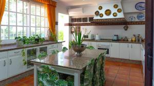Kjøkken eller kjøkkenkrok på Casa San Ignacio Cantillana by Ruralidays