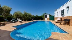 The swimming pool at or close to Huerta del Chacho Ronda by Ruralidays