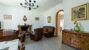 A seating area at Huerta del Chacho Ronda by Ruralidays