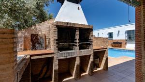The swimming pool at or close to Huerta del Chacho Ronda by Ruralidays