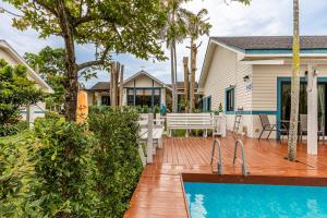 a backyard with a pool and a house at Villa Pitak Private Pool Villa Khaoyai in Ban Khanong Phra Nua