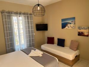 Photo de la galerie de l'établissement Ilaeira rooms, à Argassi 29 autres photos