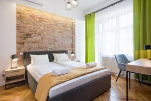 Posteľ alebo postele v izbe v ubytovaní Fancy Apartments with Lift and A/C