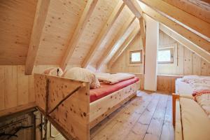 Posteľ alebo postele v izbe v ubytovaní Wichtelhütte Silberregion Karwendel
