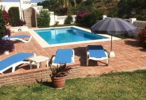 Bazén v ubytovaní Andalusian style villa alebo v jeho blízkosti